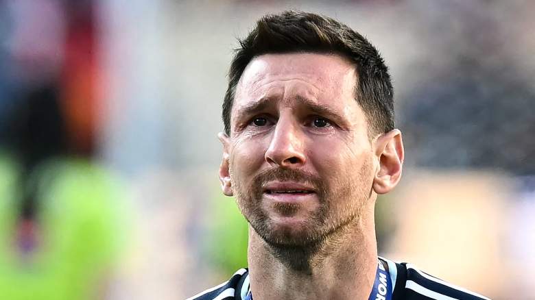 An emotional Lionel Messi wears his silver medal after Argentina’s 2026 World Cup final loss to Spain.