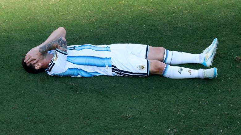 Argentina captain Lionel Messi lies on the pitch after losing to Spain in the 2026 FIFA World Cup final at MetLife Stadium.