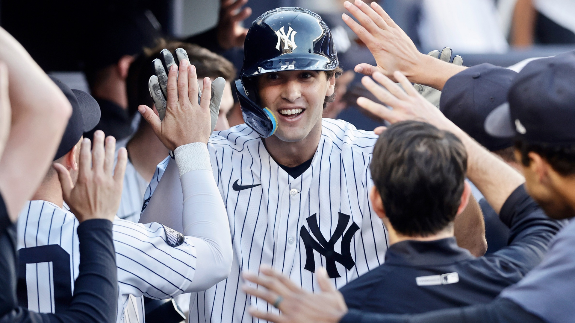 Spencer Jones #78 of the New York Yankees celebrates his second inning home run against the Chicago White Sox with his teammates in the dugout at Yankee Stadium on June 16, 2026 in New York City. (Photo by Jim McIsaac/Getty Images)