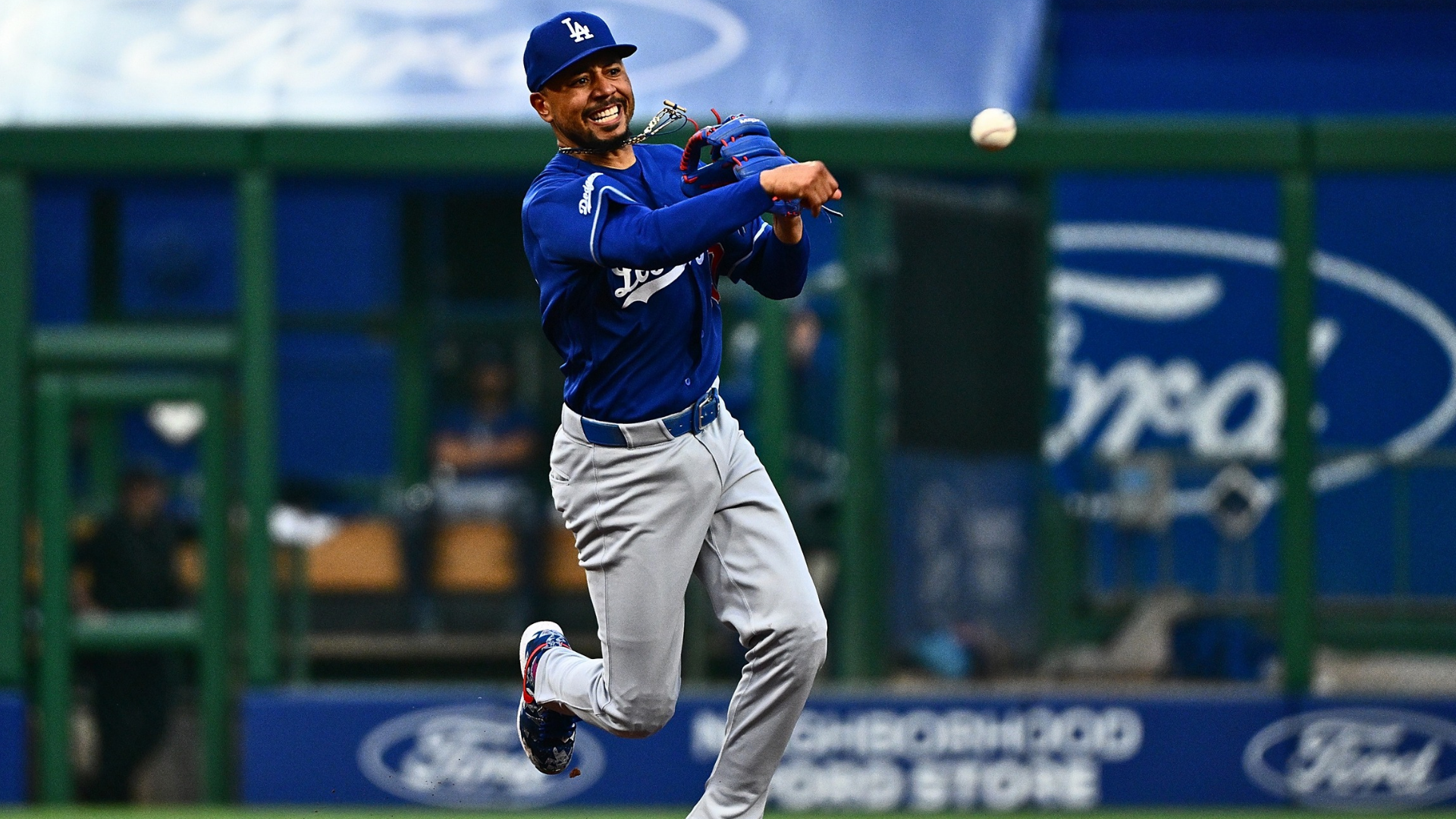 Mookie Betts #50 of the Los Angeles Dodgers throws to first base to force out Jake Mangum #28 of the Pittsburgh Pirates (not pictured) in the fifth inning during the game at PNC Park on June 11, 2026 in Pittsburgh, Pennsylvania. (Photo by Justin Berl/Getty Images)