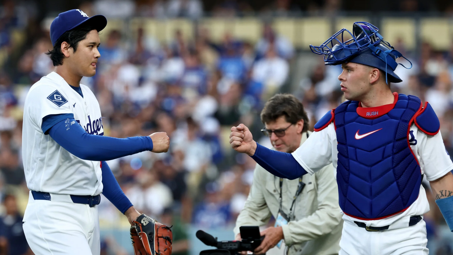 Shohei Ohtani #17 and Dalton Rushing #68 of the Los Angeles Dodgers react at the end of the first inning against the San Diego Padres at Dodger Stadium on July 03, 2026 in Los Angeles, California. (Photo by Harry How/Getty Images)