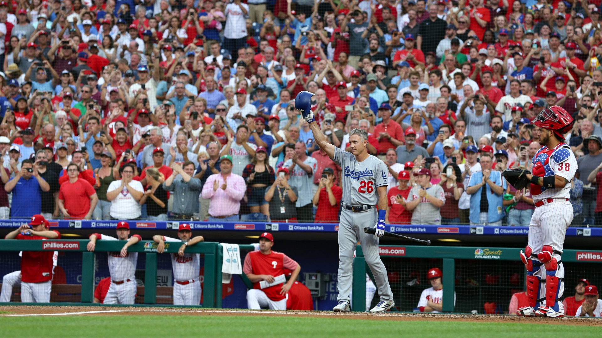 Chase Utley #26 of the Los Angeles Dodgers acknowledges a standing ovation before his first at bat in the second inning during a game against the Philadelphia Phillies at Citizens Bank Park on July 23, 2018 in Philadelphia, Pennsylvania. (Photo by Hunter Martin/Getty Images)