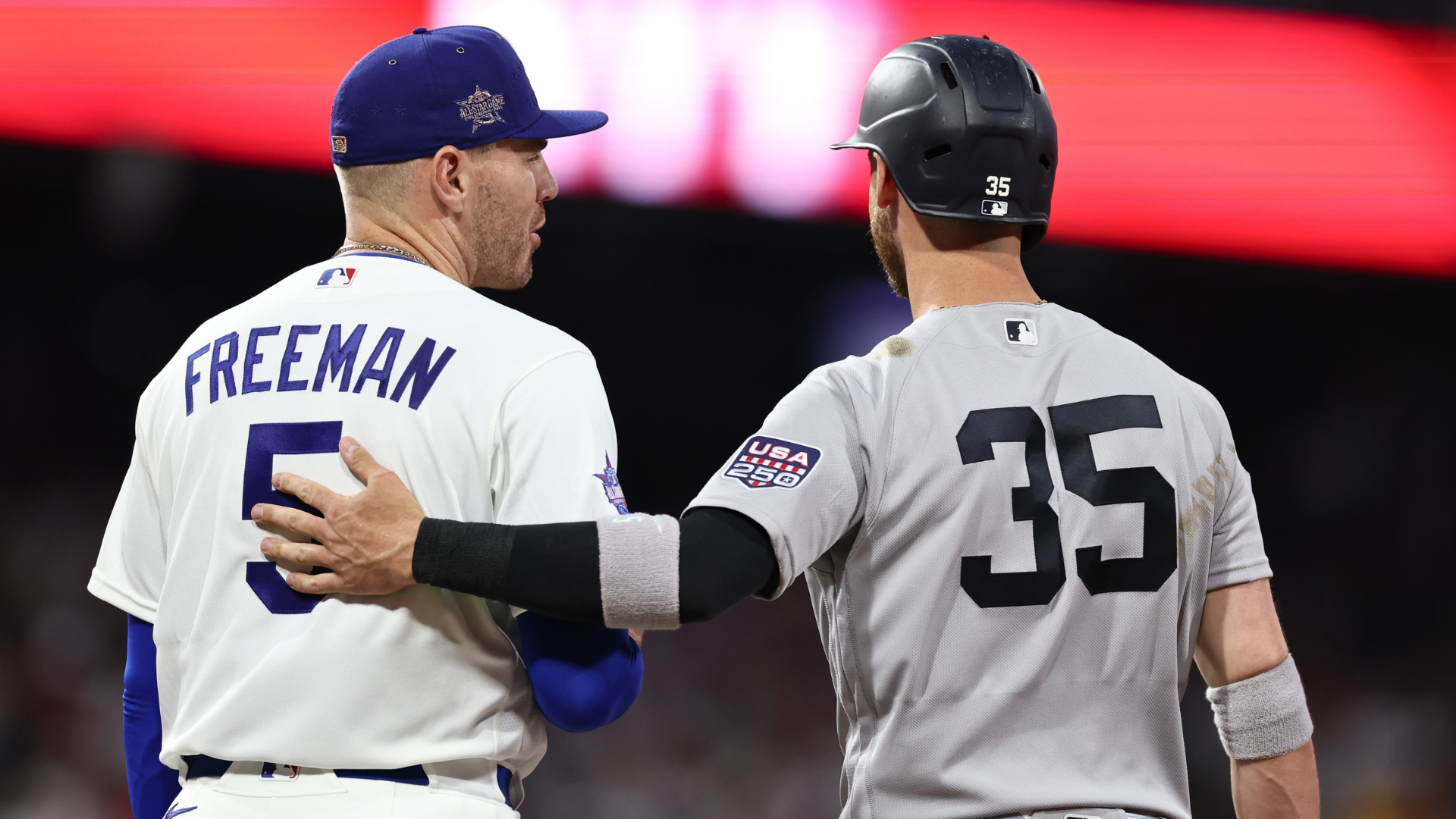 Cody Bellinger #35 of the New York Yankees speaks with Freddie Freeman #5 of the Los Angeles Dodgers during the first inning of the 2026 MLB All-Star Game at Citizens Bank Park on July 14, 2026 in Philadelphia, Pennsylvania. (Photo by Al Bello/Getty Images)