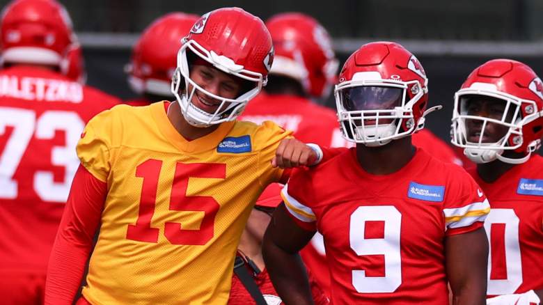 Patrick Mahomes #15 of the Kansas City Chiefs leans on Kenneth Walker #9 in mandatory minicamp at The University of Kansas Hospital Arrowhead Training Complex on June 10, 2026 in Kansas City, Missouri.