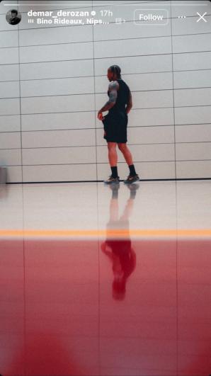 DeMar DeRozan works out in an Instagram Story while wearing black shorts with a small red logo that sparked speculation among Raptors fans.