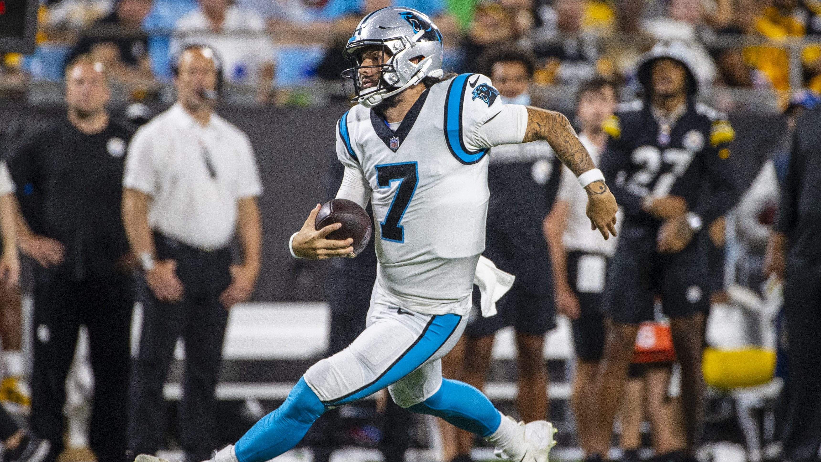 Veteran Panthers QB announces abrupt retirement; career highlights and impact explored.
