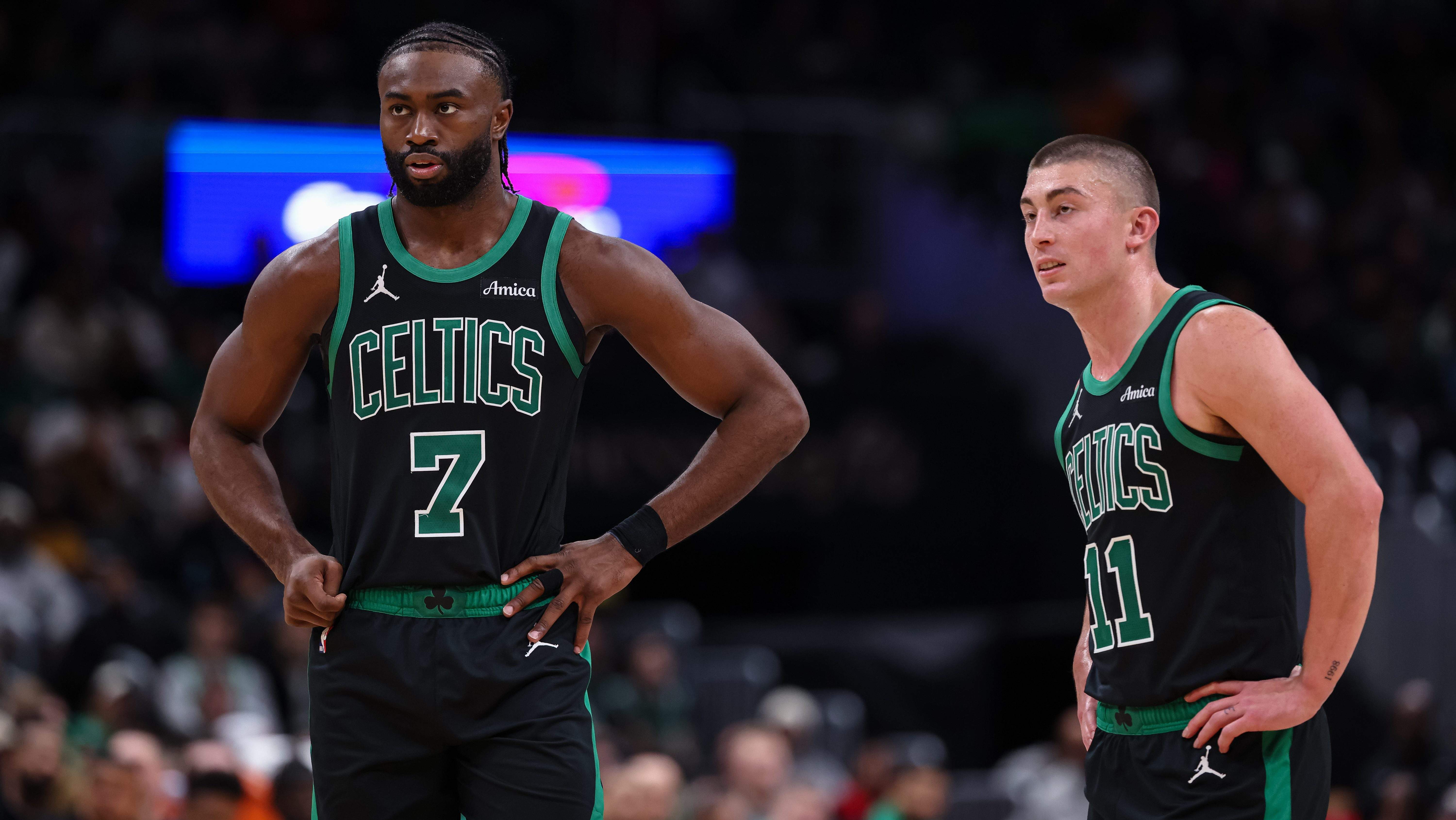 Philadelphia 76ers forward Jaylen Brown and Boston Celtics guard Payton Pritchard