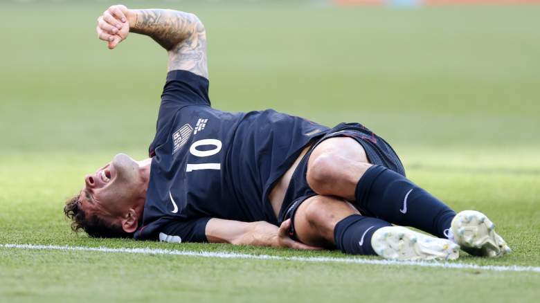 Christian Pulisic #10 of the United States reacts after challenged