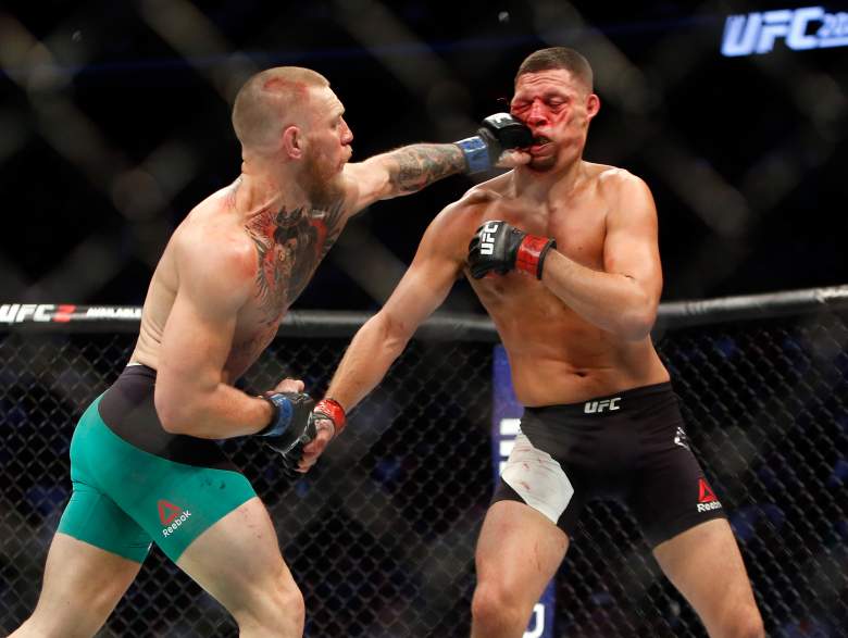 Conor McGregor punching Nate Diaz