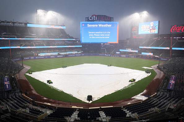 NEW YORK, NEW YORK - JUNE 12: An announcement of severe weather is shown on the scoreboard during a rain delay before the game between the New York Mets and Atlanta Braves at Citi Field on June 12, 2026 in New York City. (Photo by Dustin Satloff/Getty Images)