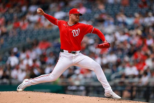 WASHINGTON, DC - JULY 12: Cade Cavalli #24 of the Washington Nationals pitches against the New York Yankees during the second inning at Nationals Park on July 12, 2026 in Washington, DC. (Photo by Scott Taetsch/Getty Images)