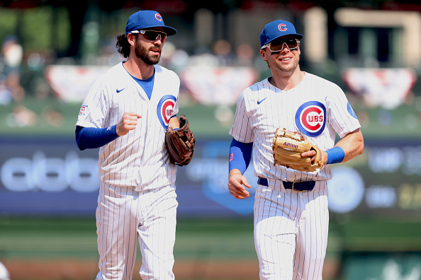 CHICAGO, ILLINOIS - JULY 19: Dansby Swanson #7 and Nico Hoerner #2 of the Chicago Cubs look on as they exit the field at the end of the eighth inning against the Minnesota Twins at Wrigley Field on July 19, 2026 in Chicago, Illinois. (Photo by Michael Hirschuber/Getty Images)