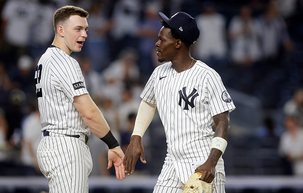 NEW YORK, NEW YORK - JULY 20: Ben Rice #22 and Jazz Chisholm Jr. #13 of the New York Yankees celebrate after defeating the Pittsburgh Pirates at Yankee Stadium on July 20, 2026 in New York City. (Photo by Jim McIsaac/Getty Images)