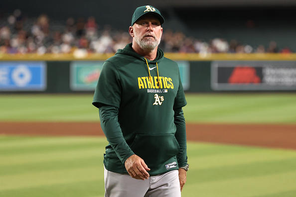 PHOENIX, ARIZONA - JULY 21: Manager Mark Kotsay #7 of the Athletics walks back to the dugout after a pitching change during the seventh inning against the Arizona Diamondbacks at Chase Field on July 21, 2026 in Phoenix, Arizona. (Photo by Chris Coduto/Getty Images)