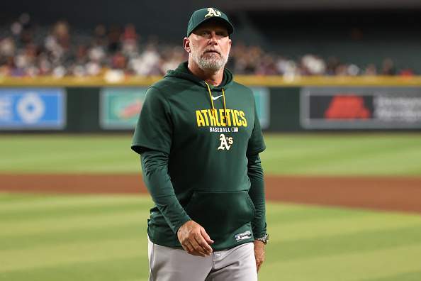 PHOENIX, ARIZONA - JULY 21: Manager Mark Kotsay #7 of the Athletics walks back to the dugout after a pitching change during the seventh inning against the Arizona Diamondbacks at Chase Field on July 21, 2026 in Phoenix, Arizona. (Photo by Chris Coduto/Getty Images)