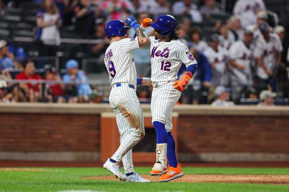 NEW YORK, NEW YORK - JULY 27: Francisco Lindor #12 and A.J. Ewing #9 of the New York Mets celebrate a home run during the third inning against the Atlanta Braves at Citi Field on July 27, 2026 in the Queens borough of New York City. (Photo by Ishika Samant/Getty Images)