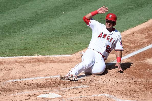 ANAHEIM, CA - OCTOBER 02:  Carlos Perez #58 of the Los Angeles Angels of Anaheim scores in the second inning against the Houston Astros at Angel Stadium of Anaheim on October 2, 2016 in Anaheim, California.  (Photo by Lisa Blumenfeld/Getty Images)