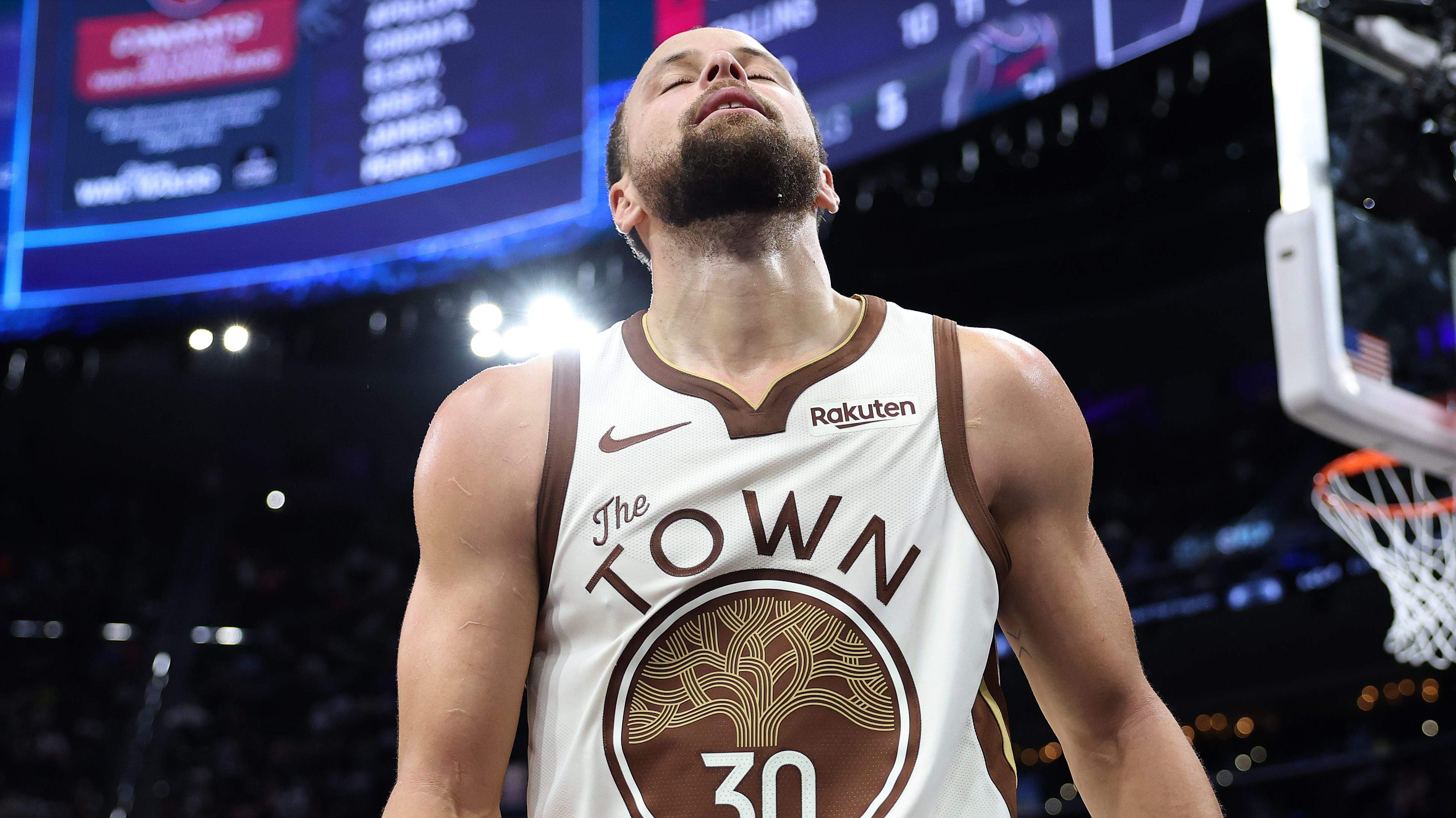 Stephen Curry during a Warriors game as a proposed trade with the Orlando Magic involving Franz Wagner gains attention.