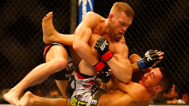 Conor McGregor and Max Holloway in their first fight
