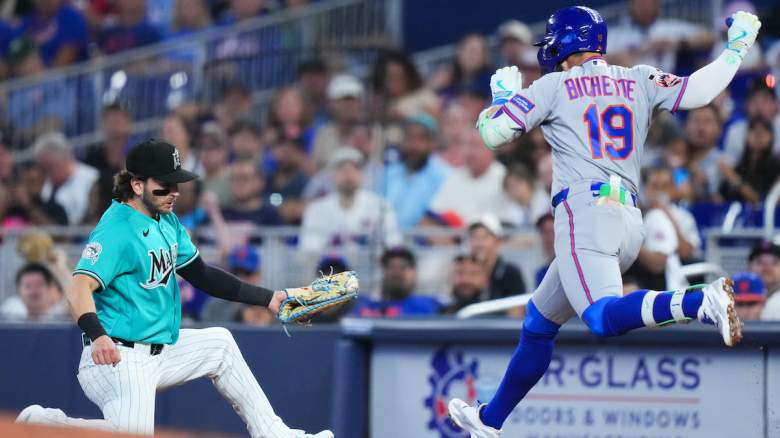 Connor Norby #1 of the Miami Marlins tags out Bo Bichette #19 of the New York Mets