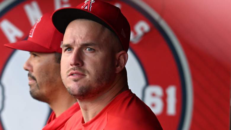 An injured Mike Trout of the Los Angeles Angels watches.