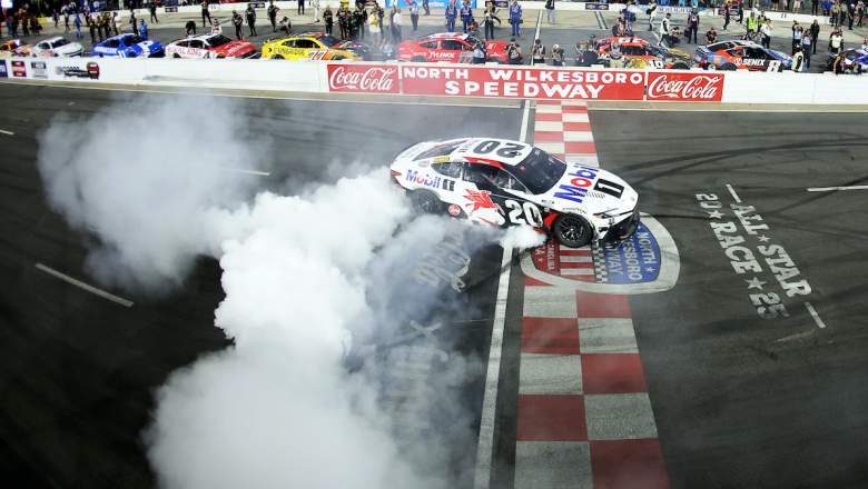 Christopher Bell, driver of the #20 Mobil 1 Toyota, celebrates with a burnout