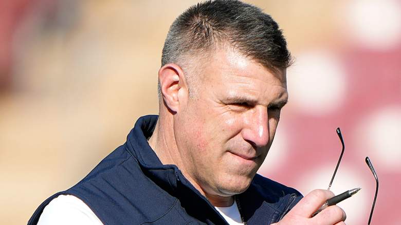 Head coach Mike Vrabel of the New England Patriots looks on during drills.