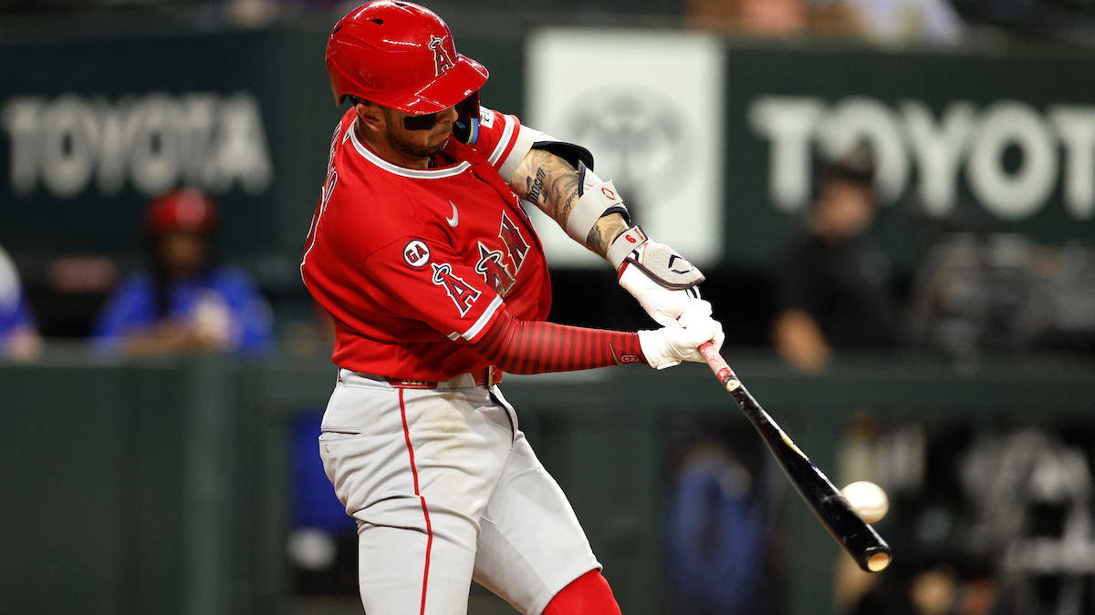 Zach Neto #9 of the Los Angeles Angels doubles against the Texas Rangers