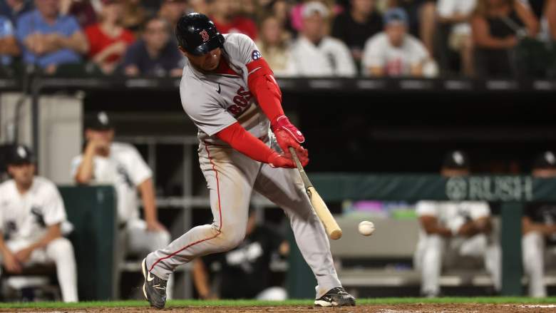 Boston Red Sox first baseman Willson Contreras swings at a pitch against the Chicago White Sox at Rate Field.