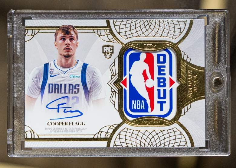 Cooper Flagg one-of-one NBA Rookie Debut Patch Autograph card in a protective display case