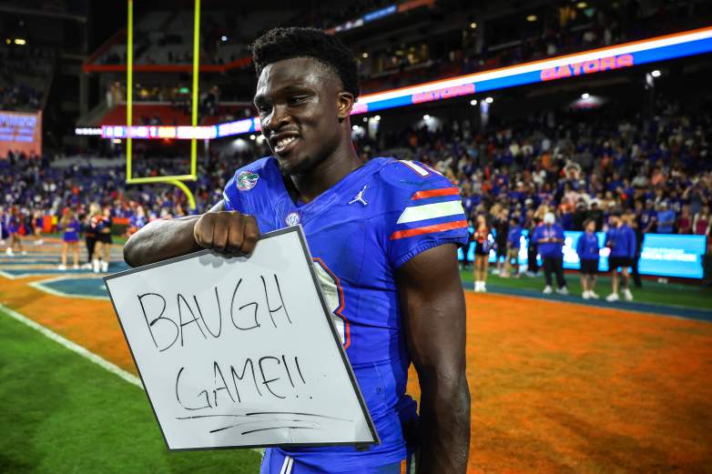Jadan Baugh holds up sign