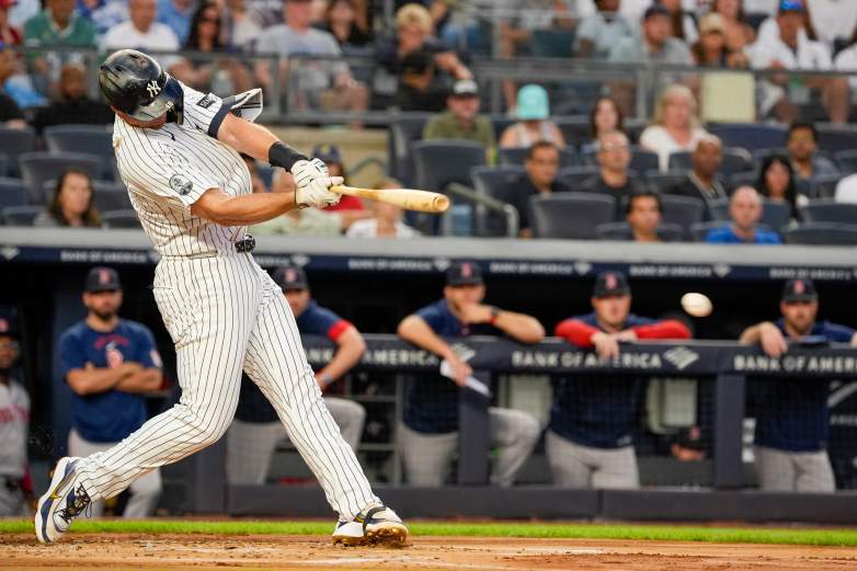 Yankees Paul Goldschmidt hitting a baseball with hit bat