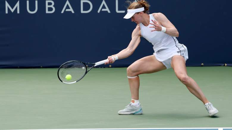 Liudmila Samsonova returns a shot