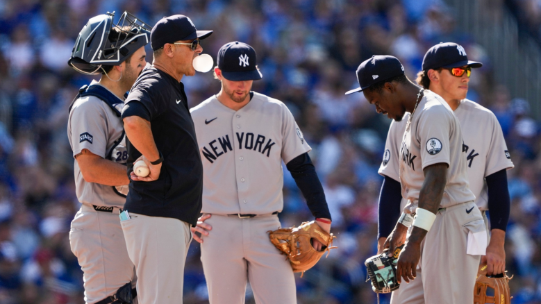 Manager Aaron Boone of the New York Yankees stands on the mound in a break in play during the sixth inning of an MLB game against the Toronto Blue Jays at the Rogers Centre on August 15, 2026 in Toronto, Ontario, Canada. (Photo by Mark Blinch/Getty Images)