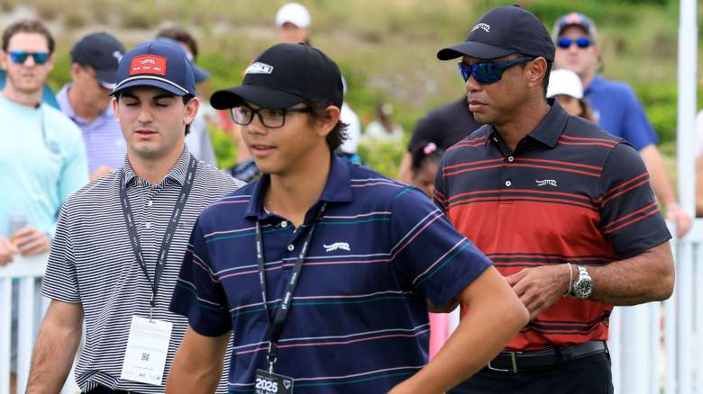 Tiger Woods of The United States the tournament host leaves the driving after watching the players warm up with his son Charlie Woods of The United States (L) during the final round of the Hero World Challenge 2025 at Albany Golf Course on December 07, 2025 in Nassau, Bahamas