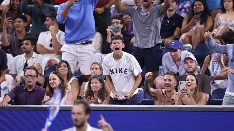Fans cheer for Daniil Medvedev during a delay in play after a controversial call in the third set against Benjamin Bonzi of France during their Men's Singles First Round match on Day One of the 2025 US Open at USTA Billie Jean King National Tennis Center on August 24, 2025 in the Flushing neighborhood of the Queens borough of New York City