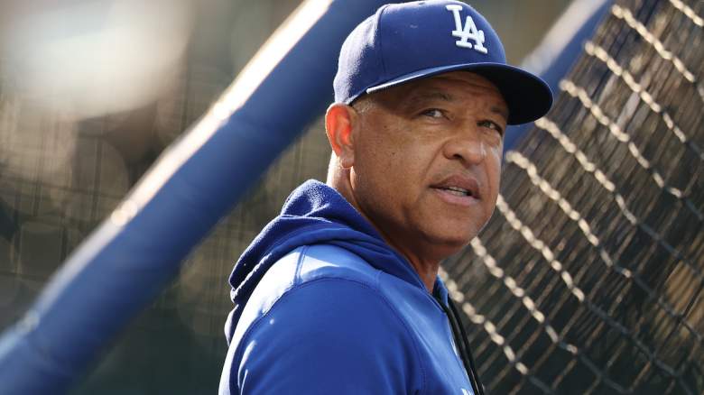 Manager Dave Roberts #30 of the Los Angeles Dodgers looks on during batting practice
