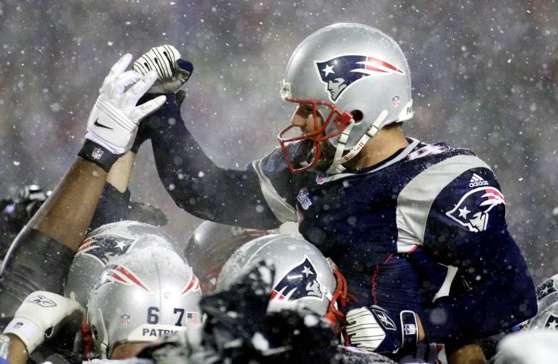 Field kicker Adam Vinatieri (L) of the New England