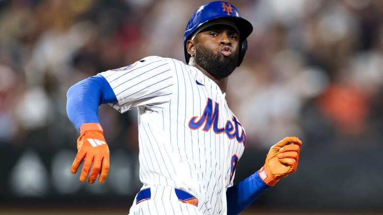 Luis Robert Jr. #88 of the New York Mets celebrates hitting a solo home run