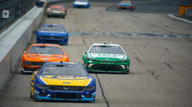 Chase Briscoe, driver of the #14 Zep Ford, Austin Cindric, driver of the #2 Autotrader Ford, and Erik Jones, driver of the #43 Dollar Tree Toyota, race during the NASCAR Cup Series USA