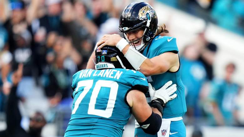 Jacksonville Jaguars offensive lineman Cole Van Lanen and quarterback Trevor Lawrence