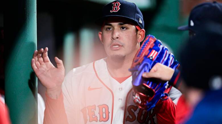 Eduardo Rivera #99 of the Boston Red Sox is greeted