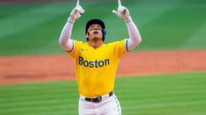 Jahmai Jones #37 of the Boston Red Sox reacts after hitting a home run