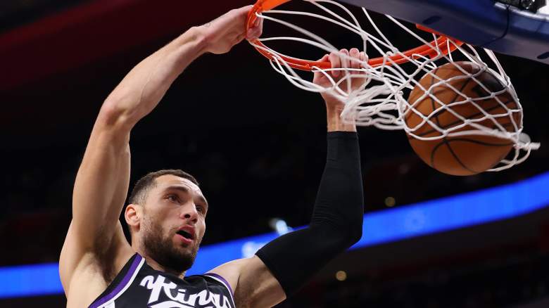 Zach LaVine dunks the ball during a Sacramento Kings-Detroit Pistons game amid speculation about his future.