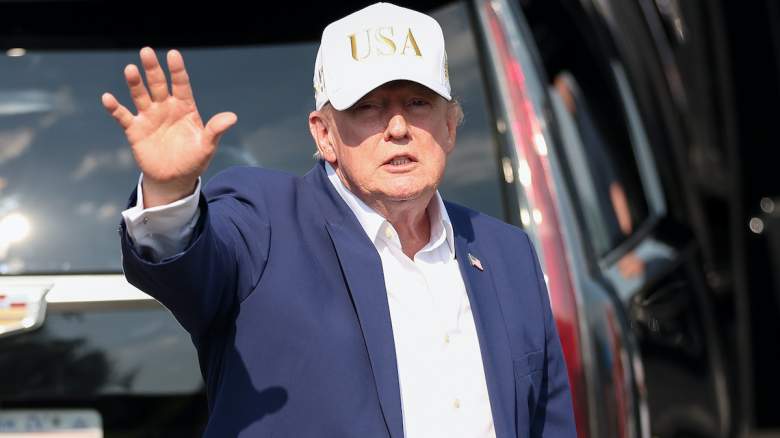 U.S. President Donald Trump waves to attendees
