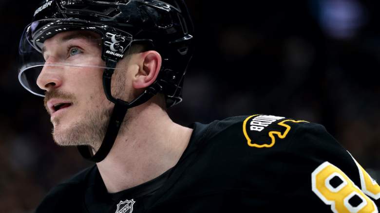 Tanner Jeannot #84 of the Boston Bruins looks on