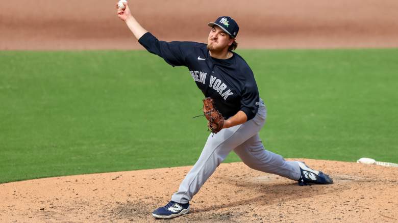Ben Hess #68 of the New York Yankees throws a pitch