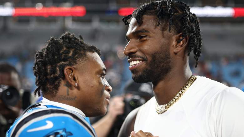 Quarterback Shedeur Sanders #12 of the Cleveland Browns and wide receiver Jimmy Horn Jr. #15 of the Carolina Panthers