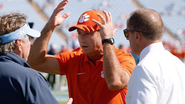 Clemson Tigers Dabo Swinney speaking to North Carolina Tar Heels Bill Belichick