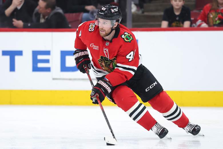 Matt Grzelcyk skates for the Blackhawks.